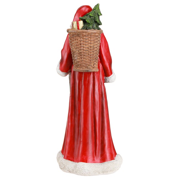 Weihnachtsmann Figur mit Geschenken und Tanne im Korb auf dem Rücken