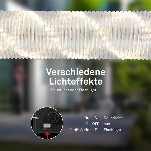 Helle Werkstatt mit einem Elektroauto, abgesperrt mit einer Warnkette und einem Warnschild für Hochspannung. Volkswagen Logo und KS Tools Logo.