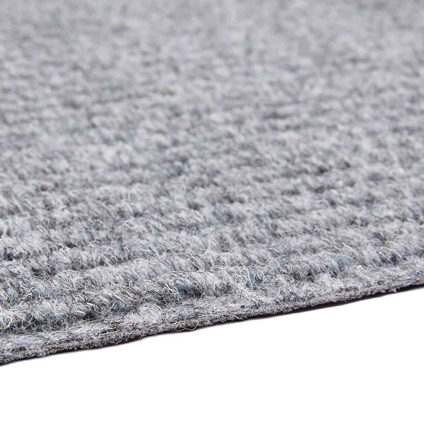 Nahaufnahme eines grauen Teppichs