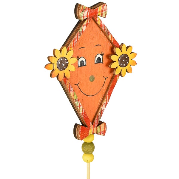 Dekofigur mit Gesicht und Sonnenblumen