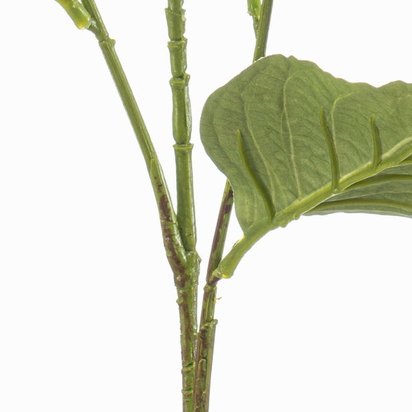 Nahaufnahme eines künstlichen Pflanzenstiels mit einem grünen Blatt und einem strukturierten Zweig.
