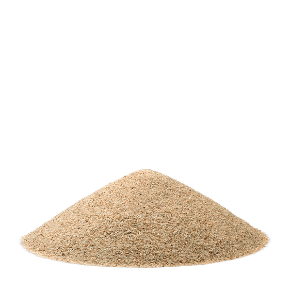 Ein Haufen feiner, hellbeiger Sand.