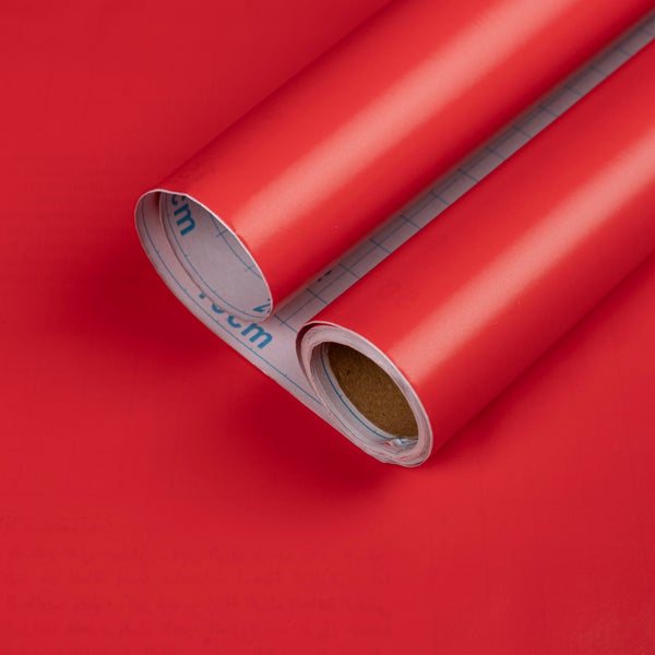 Selbstklebefolie in Rot, matte Oberfläche, mit Gitternetz auf der Rückseite zum einfachen Zuschneiden.