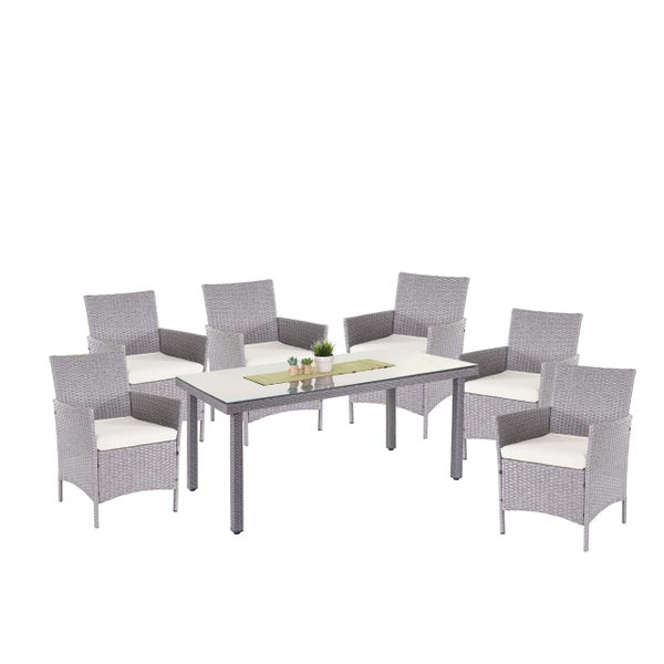 Gartensitzgruppe aus grauem Polyrattan-Geflecht bestehend aus einem rechteckigen Tisch mit Glasplatte und sechs Sesseln inklusive weißer Sitzkissen.