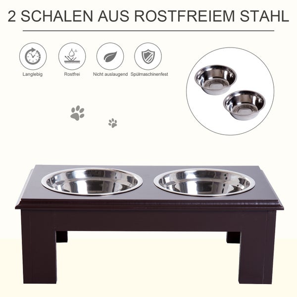 Erhöhte Futterstation aus dunklem Holz, zwei Schalen aus rostfreiem Stahl. Merkmale: langlebig, rostfrei, nicht auslaugend und spülmaschinenfest.