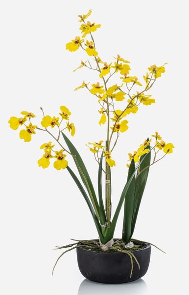 Künstliche Orchidee mit gelben Blüten und grünen Blättern, Detailaufnahme der Stiele.