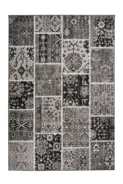 Rechteckiger Teppich in Grau mit Patchwork-Muster und verschiedenen orientalischen Ornamenten.