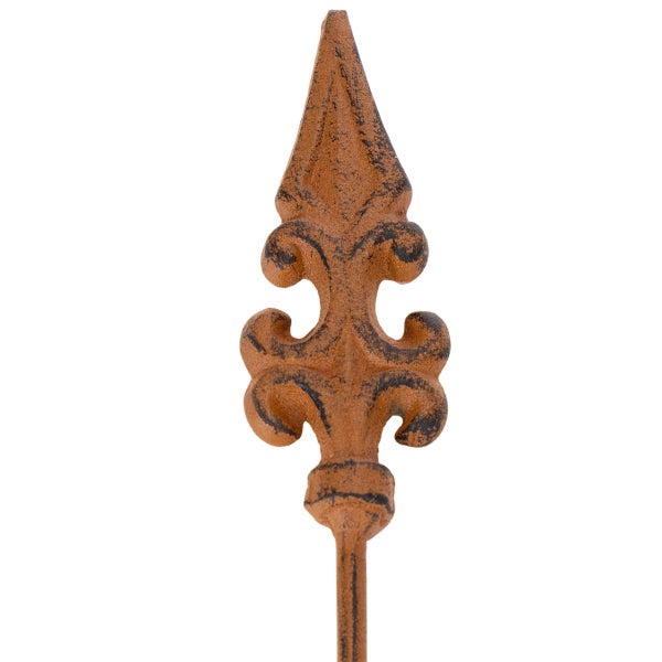 Zierspitze aus Metall mit Lilienmuster