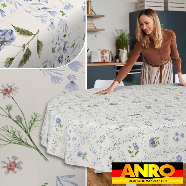 Ovale Tischdecke mit floralem Aquarellmuster auf einem Tisch in einer Küche, ANRO Logo.
