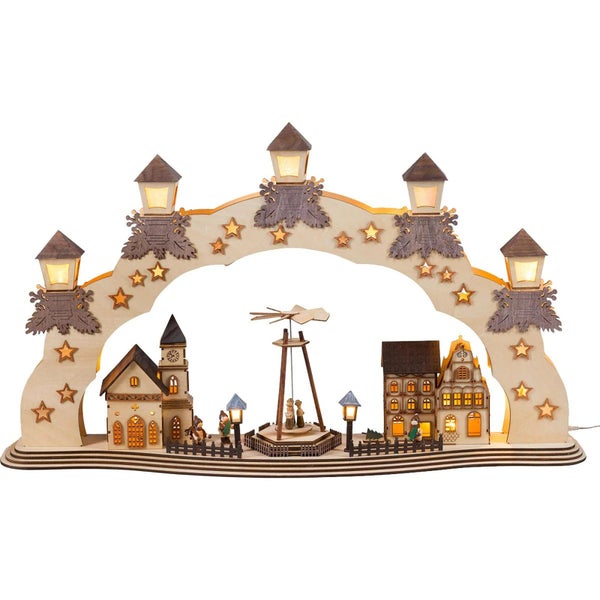 Beleuchteter Schwibbogen aus Holz mit winterlicher Dorflandschaft und Sternenmotiv für die weihnachtliche Dekoration.
