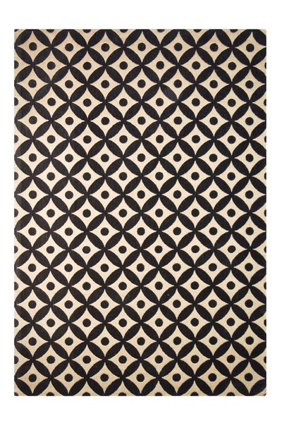 Teppich mit geometrischem Muster aus Kreisen und Punkten.