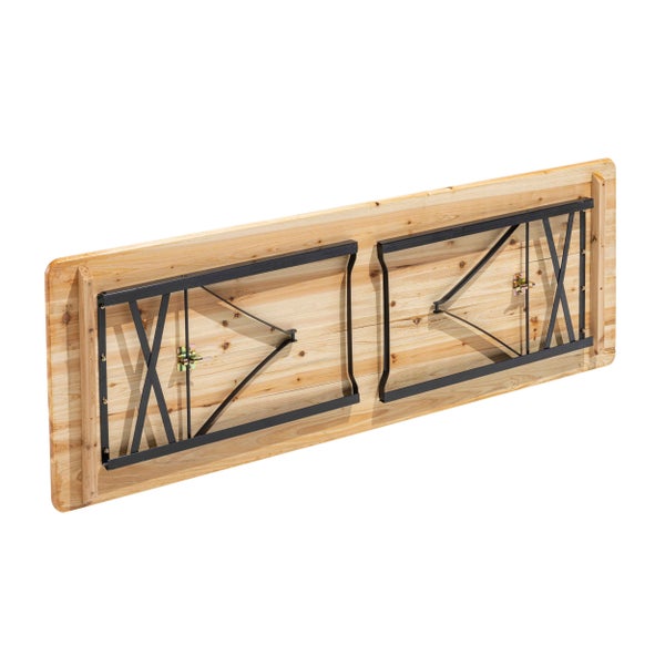 Unterseite eines zusammenklappbaren Holztisches mit eingeklappten Metallbeinen und Verriegelung.