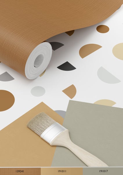 Tapetenrolle mit geometrischem Muster, Farbfelder und ein Pinsel
