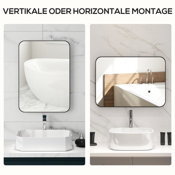 Badezimmer mit Spiegel, Waschbecken und Ablagetisch