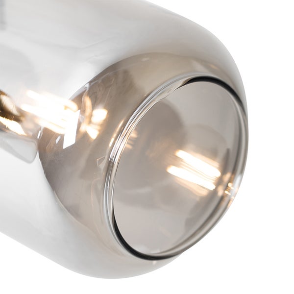 Detailaufnahme einer transparenten Glaslampe, die ihre innere Struktur zeigt