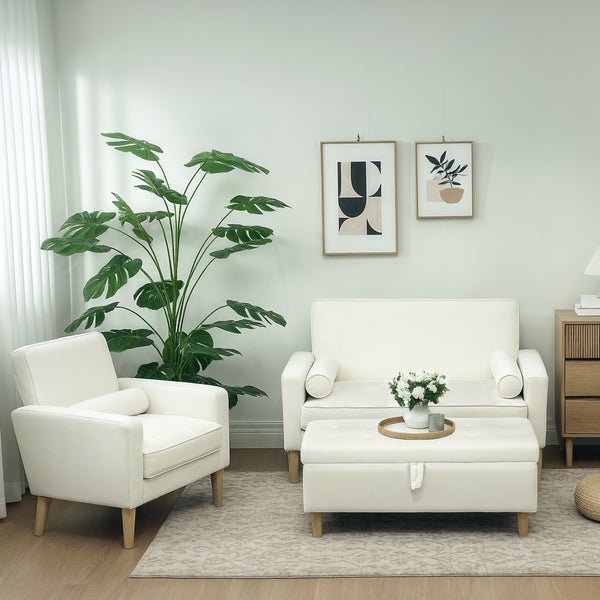 Weißer Hocker mit Stauraum und einem gefüllten Innenraum auf einem Teppich