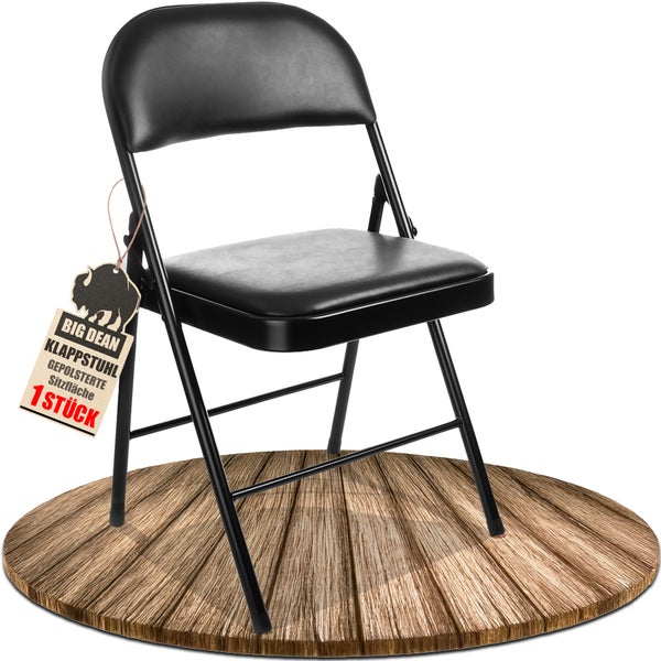 Schwarzer Klappstuhl mit gepolsterter Sitzfläche auf Holzuntergrund
