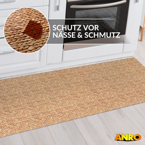 Küchenläufer mit Flechtoptik vor weißer Küchenzeile, bietet Schutz vor Nässe und Schmutz, ANRO Logo.