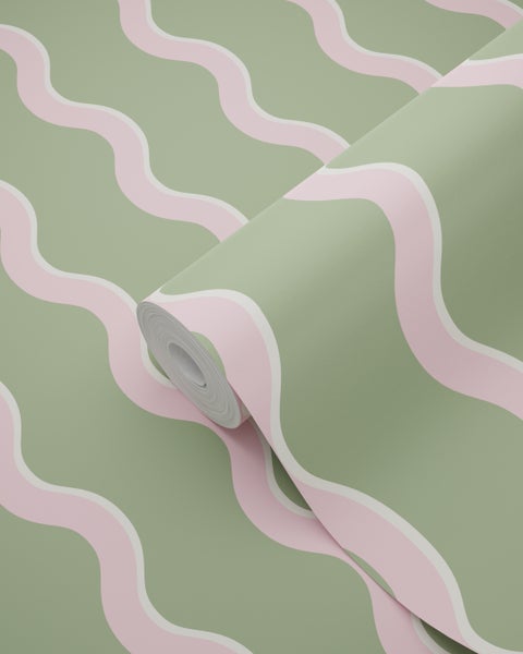 Tapetenrolle mit einem Wellenmuster in Grün und Rosa.