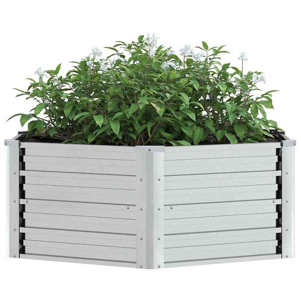 Achteckiges Hochbeet aus Metall in Silber mit grünen Pflanzen und weißen Blüten.