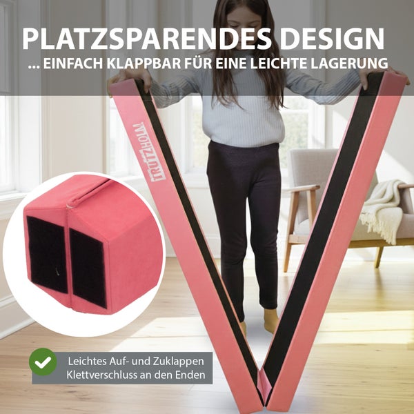 Klappbarer rosa Schwebebalken von Trutzholm für Kinder in einem hellen Zimmer, platzsparendes Design und Detailansicht des Klettverschlusses.