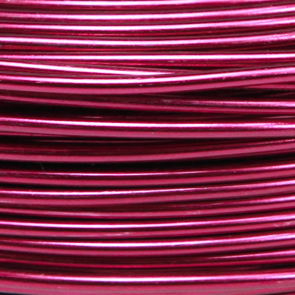 Pinkfarbener Aluminiumdraht, aufgewickelt.