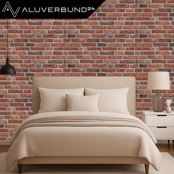 Schlafzimmer mit roter Backsteinwand von Aluverbund24