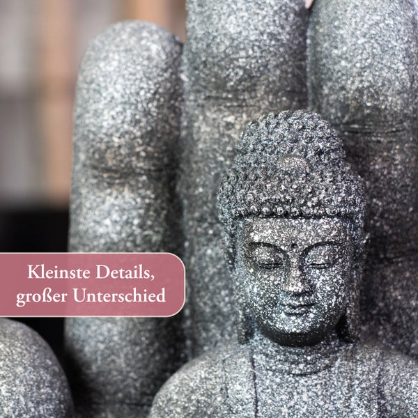 Detailaufnahme einer Buddha-Skulptur aus Stein mit fein strukturierter Oberfläche für Garten und Wohnbereich.