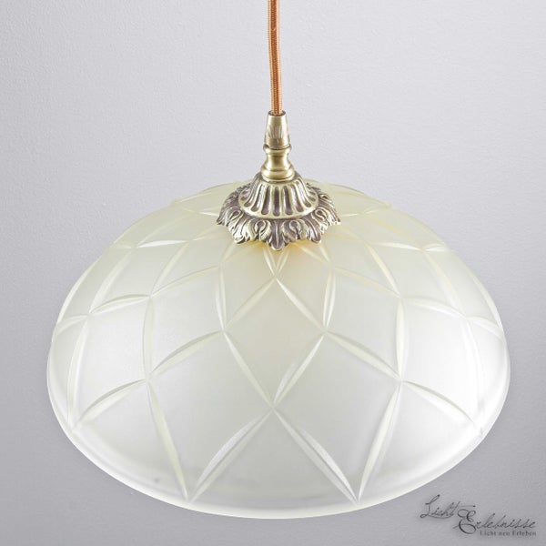 Hängelampe mit geometrischem Muster und Stoffkabel