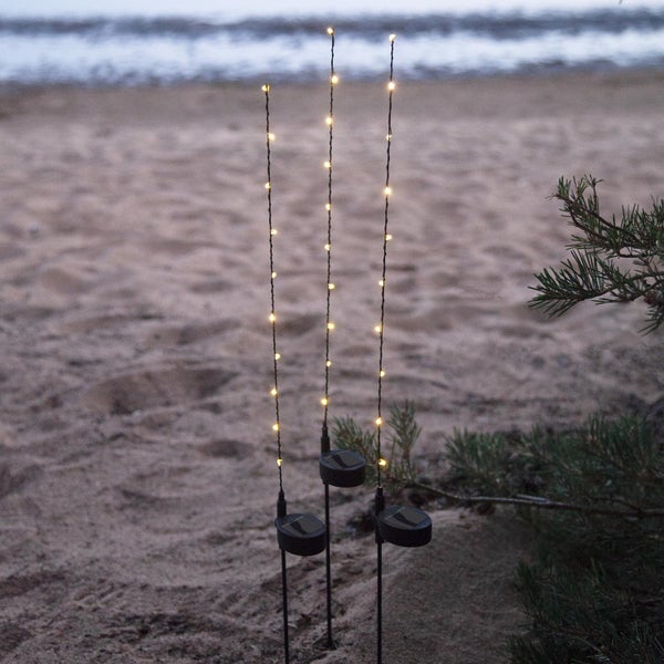 Lichterkette mit bunten Papierlaternen