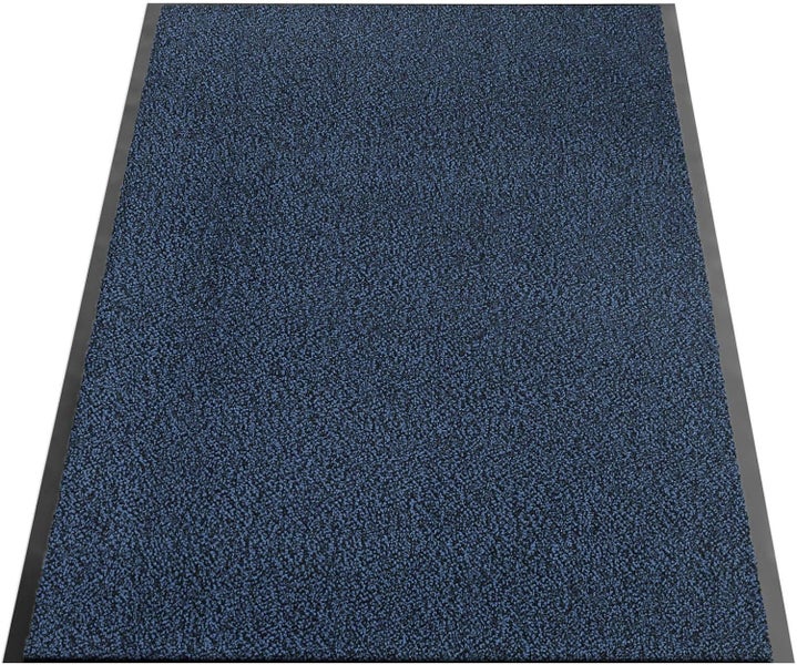 Detailansicht einer blauen Fußmatte mit rutschfester Unterseite