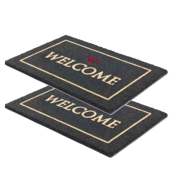 Zwei Fußmatten mit der Aufschrift Willkommen