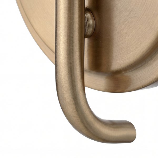 Detailansicht einer Wandleuchte mit gebogenem Arm