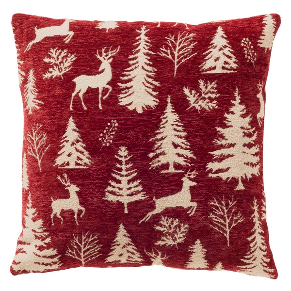 Quadratisches Dekokissen mit weihnachtlichem Muster aus Hirschen und Tannenbäumen für die Festtagsdekoration.