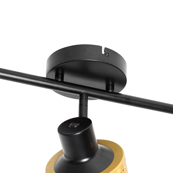 Detailaufnahme einer Deckenleuchte mit Strahler