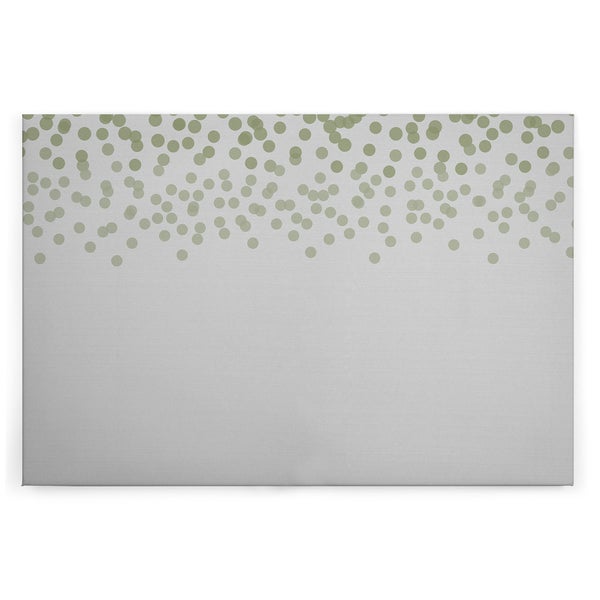 Wandbild mit Konfettimuster oben auf glatter Oberfläche als moderne Wanddekoration.