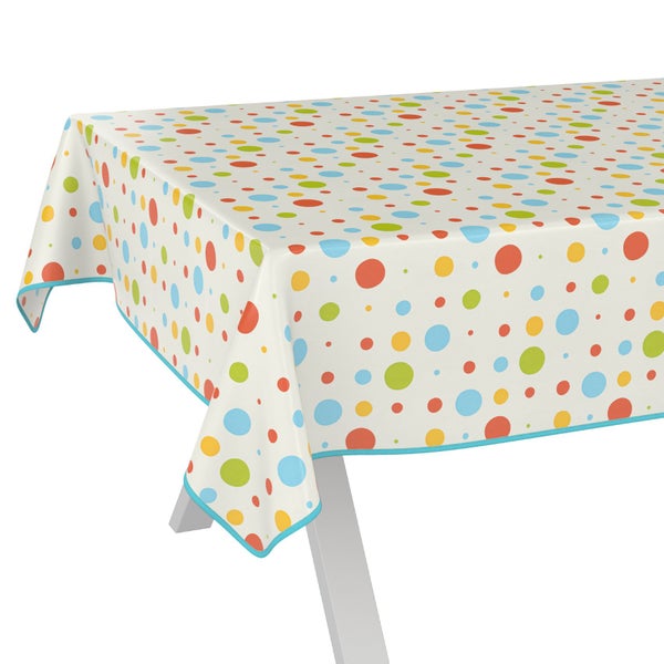Tischdecke mit Punktmuster auf einem Tisch