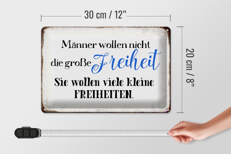 Dekoratives Schild mit dem Spruch 'Männer wollen nicht die große Freiheit. Sie wollen viele kleine Freiheiten.'