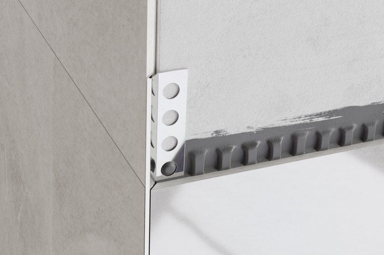 Detailaufnahme einer Ecke mit Fliesen, Fliesenschiene und Fliesenkleber