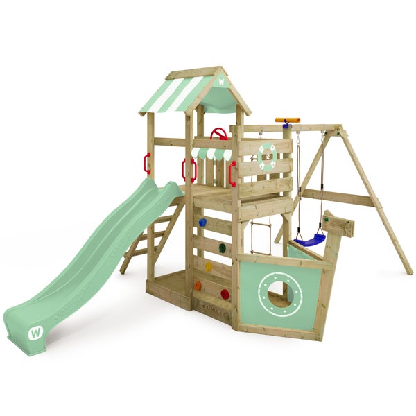 WICKEY Spielturm Klettergerüst SeaFlyer mit Schaukel und Rutsche, Baumhaus mit Sandkasten, Kletterleiter und Spiel-Zubehör – pastellgrün
