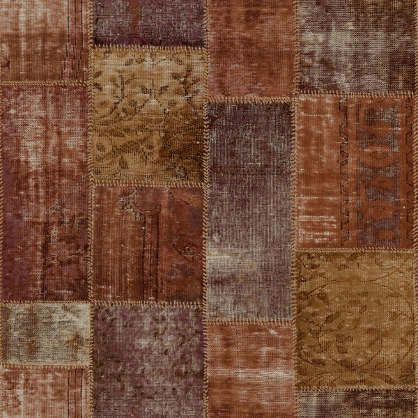 Teppich im Patchwork-Design mit verschiedenen Mustern