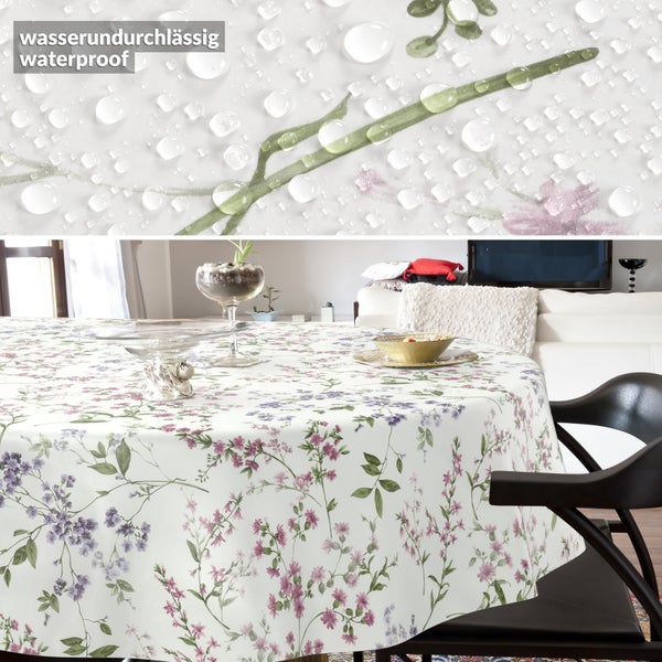 Wasserdichte, runde Tischdecke mit floralem Muster auf einem Tisch in einem hellen Wohnzimmer und Detailansicht abperlender Wassertropfen.