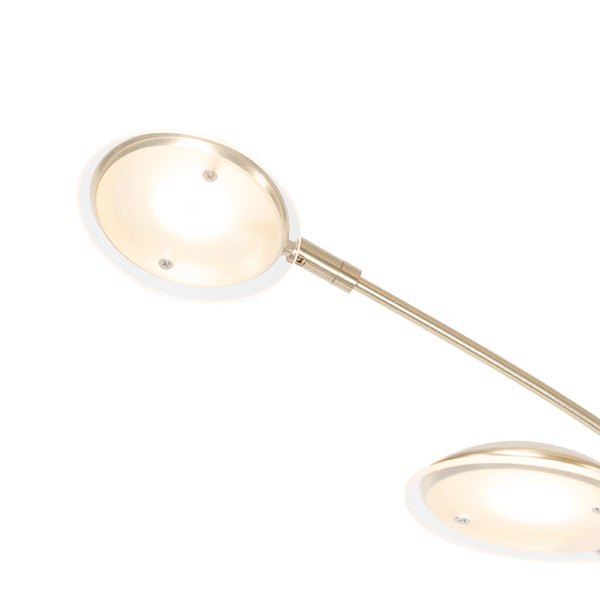 Nahaufnahme einer Deckenleuchte mit runden, flachen Lampenschirmen