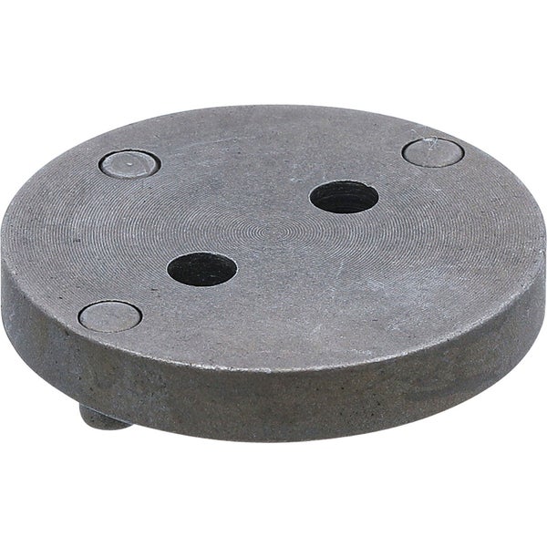 Runde Metallplatte mit Löchern und Füßen