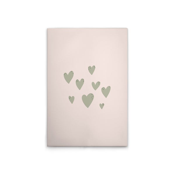 Dekokissen mit Herzmotiven