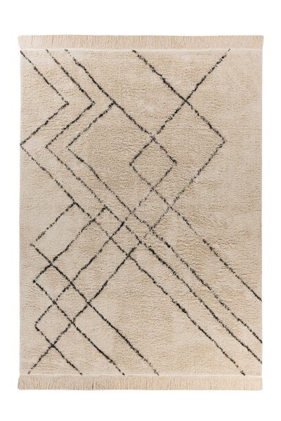Beiger Hochflor-Teppich mit schwarzem geometrischem Linienmuster und Fransen.