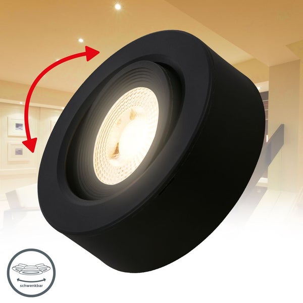 Schwarzer runder Deckenstrahler mit schwenkbarem Leuchtkopf.