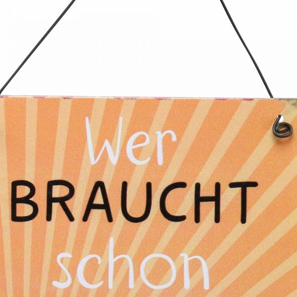 Dekoratives Schild mit dem Spruch: Wer braucht schon...