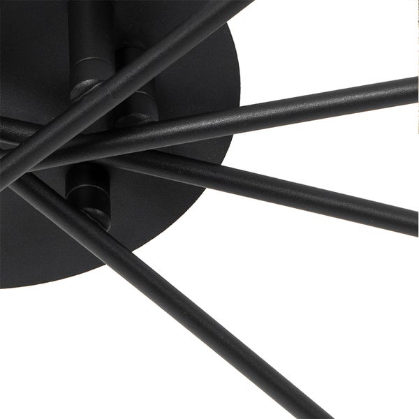 Detailaufnahme einer Deckenleuchte mit Metallgestell