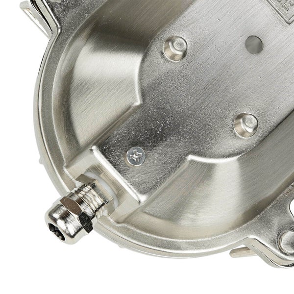 Detailansicht eines runden Metallgehäuses mit Schrauben und Anschlussstück